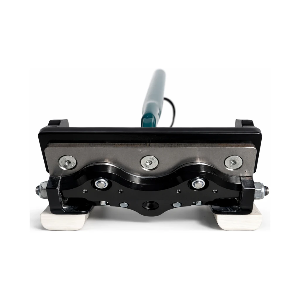 Front view of the wave shaped corrugated blade on the EERA notcher