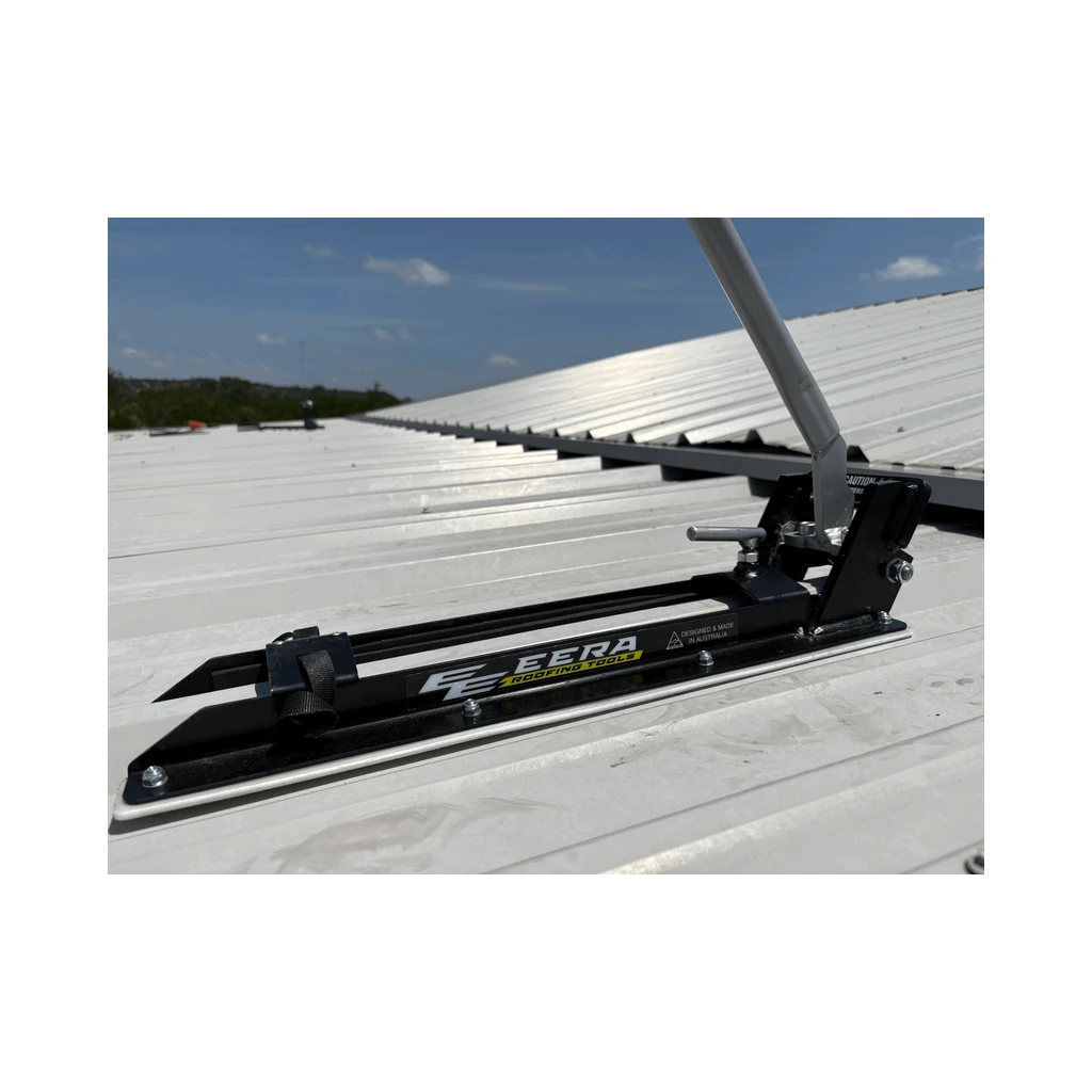 EERA R Panel notcher with silver handle sitting on a ribbed metal roof